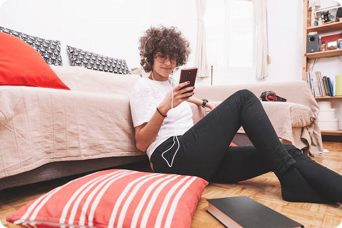 Young man on a telehealth Suboxone appointment by phone.