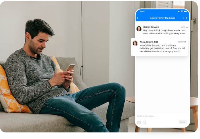 Man using earbuds for a virtual Suboxone consultation.